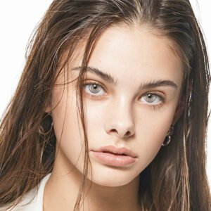 Model wearing Blush Sea Gray 14.5mm colored contacts