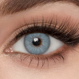 Model wearing Love Story Blue Contact Lenses 14.2mm natural sky blue look