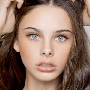 Model wearing Holland Hue Gray 14.0mm colored contacts