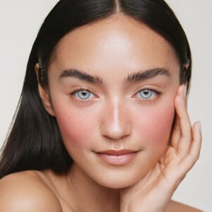 Model wearing Gemflare Blue Contact Lenses 14.2mm natural bright blue look