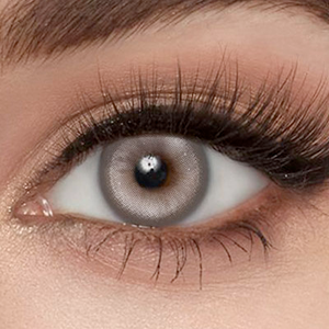 Model wearing Gemland Coffee Contact Lenses 14.5mm natural brown look